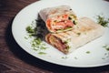 Smoked salmon wrap with vegetables Royalty Free Stock Photo