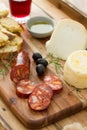 Smoked sausage, cheese, bread and glass Royalty Free Stock Photo