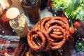 Smoked sausage on a grocery store window. Trade in meat products in a butcher shop Royalty Free Stock Photo