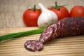 Smoked sausage with rustic food Royalty Free Stock Photo