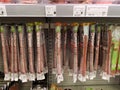 Smoked sausages on sale in a supermarket