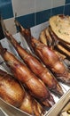 Smoked sea bass on the counter. Fish market.