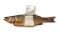 Smoked sea bass with a piece of skin removed on white background