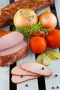 Smoked sliced pork tenderloins. Homemade smoked pork ham. Royalty Free Stock Photo