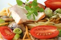Smoked trout with colored spaghetti and vegetable Royalty Free Stock Photo