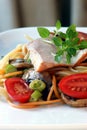 Smoked trout with colored spaghetti and vegetable Royalty Free Stock Photo