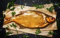 Smoked Tsimlyansky bream on dark background, top view Royalty Free Stock Photo