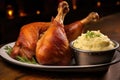 smoked turkey legs with a side of mashed potatoes Royalty Free Stock Photo