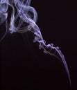 Smokes on black background