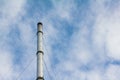 Smokestack with blue sky and soft cloud Royalty Free Stock Photo