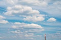 Smokestack chimney industry pollute blue sky clouds Royalty Free Stock Photo