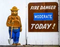 Smokey the Bear sign with fire advisory at state park