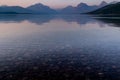 Smokey hazy view of Lake McDonald at sunset in Glacier National Park Royalty Free Stock Photo