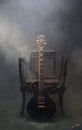 Smokey stillife of electric guitar with dramatic lighting Royalty Free Stock Photo