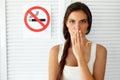 Smoking. Beautiful Woman With No Smoking Sign On Background Royalty Free Stock Photo