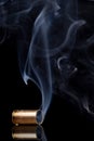 Smoking bullet casing Royalty Free Stock Photo
