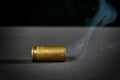 Smoking bullet casing