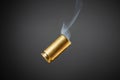 Smoking bullet casing Royalty Free Stock Photo
