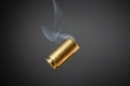 Smoking bullet casing Royalty Free Stock Photo