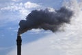 Smoking chimney producing greenhouse gasses