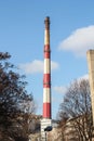 Smoking chimneys of the factory. red-white pipe factory Royalty Free Stock Photo