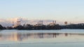 Smoking chimneys of a thermal power plant against a winter cloudy sky. Ecological problems concept. Space for text.