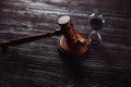 Smoking cigarette, hourglass and wooden judge gavel. Dangerous addiction and law Royalty Free Stock Photo