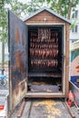 Smoking fish in a smoker in a street traditional market
