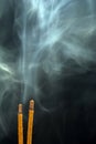 Smoking flavored sticks on a black background Royalty Free Stock Photo