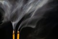 Smoking flavored sticks on a black background Royalty Free Stock Photo