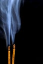Smoking flavored sticks on a black background Royalty Free Stock Photo