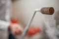 Smoking frozen pipe for liquid nitrogen Royalty Free Stock Photo