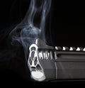 Dark smoking gun Royalty Free Stock Photo