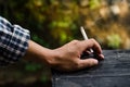 Smoking in the hands of men. Royalty Free Stock Photo