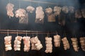 Smoking meat in the smokehouse