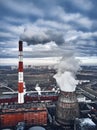 Smoking pipes of thermal power plant. Aerial view. Pipes of thermal power plant. heating of the city. Royalty Free Stock Photo