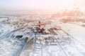 Smoking pipes of thermal power plant against blue sky in winter time. Aerial view Royalty Free Stock Photo