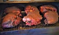 Smoking Pork Shoulders on a Traeger Pellet Smoker Royalty Free Stock Photo