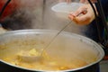 Smoking Stew In The Pot, Scoop And Plastic Plate