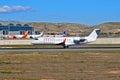 Smoking tyres Air Iberia Aircraft Landing At Alicante Airport Royalty Free Stock Photo