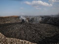 Smoking volcanic pinnacle close to Erta Ale volcano, Ethiopia