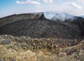 Smoking volcanic pinnacle close to Erta Ale volcano, Ethiopia