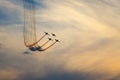 Smoky acrobatic planes on colorful sky