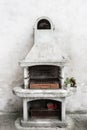 Smoky antique brick oven outdoor with ashes inside. Old garden heater. grill usable for BBQ. patio Vienna, Austria Royalty Free Stock Photo