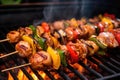 smoky barbecue grill with juicy shrimp on skewers