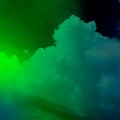 Smoky clouds dark light green blue color mixture effects texture background wallpaper.