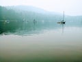 Sailboat in the mist.