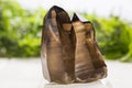 Smoky quartz on a white background mineral specimen.