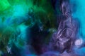 smoky wallpaper with blue, purple and green paint swirls looks like space Royalty Free Stock Photo