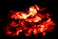 Smoldering ashes of a bonfire